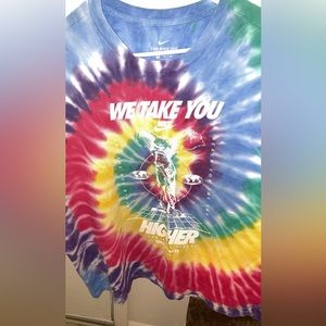 This is a men Nike tie-dye oversized t-shirt. Size 2xl but fits bigger.